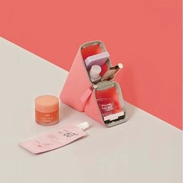 Pen case with a pink background