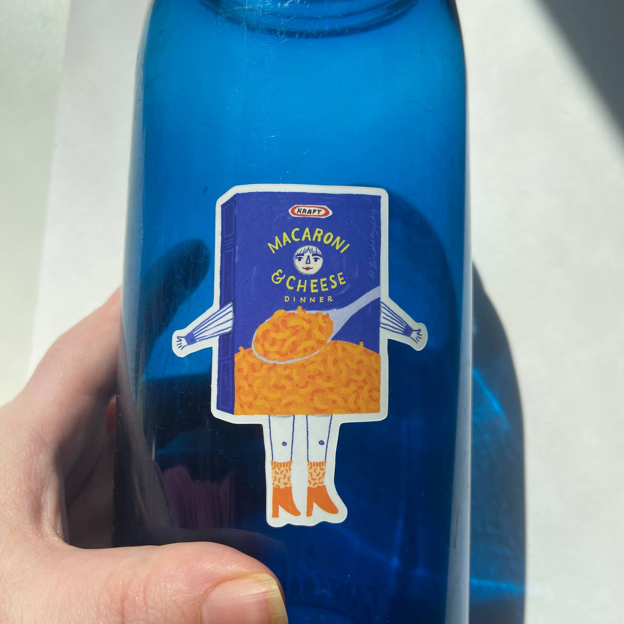 Maggie Mac N' Cheese Sticker, 2x3 in.