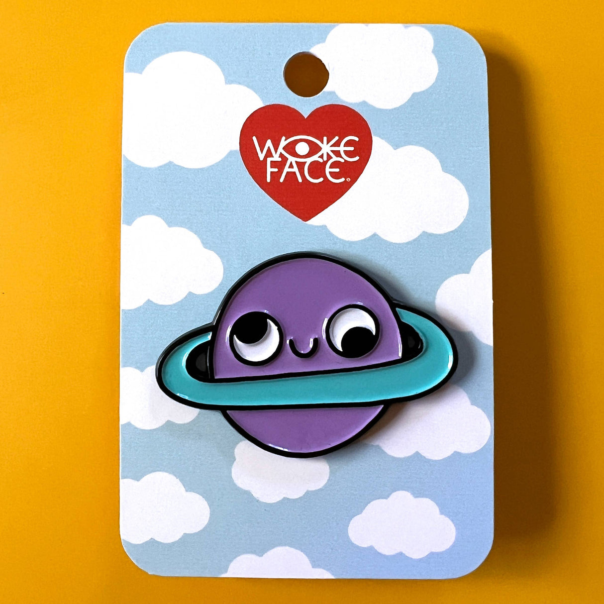 Retrograde Planet Enamel Pin